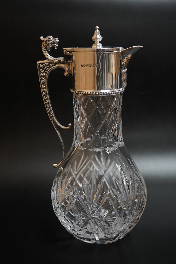An Elizabeth II silver mounted cut glass claret jug, by J. Bros, Sheffield, 1978, height 28.5cm.